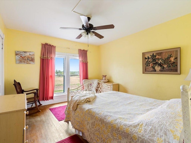 114 Washburn Ave W, Backus, MN 56435 - bedroom with hardwood / wood-style flooring and a ceiling fan