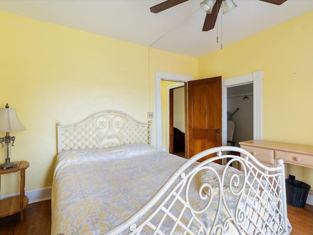 114 Washburn Ave W, Backus, MN 56435 - bedroom with wood finished floors, baseboards, and ceiling fan