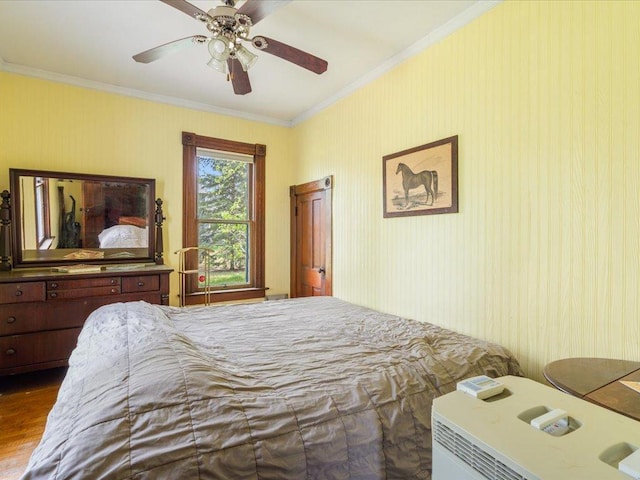 114 Washburn Ave W, Backus, MN 56435 - bedroom featuring ornamental molding, wood finished floors, and ceiling fan