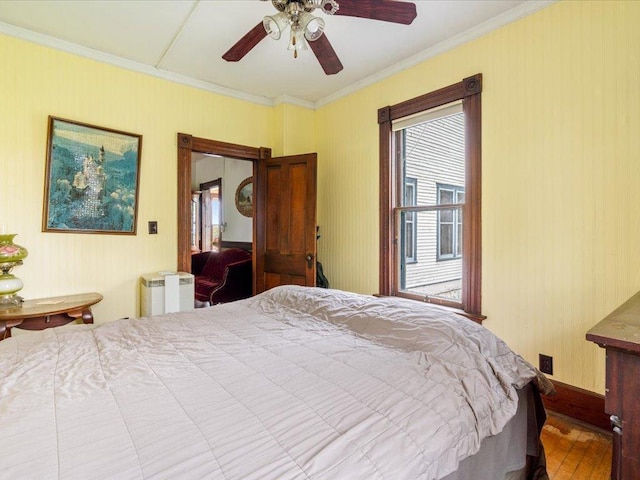 114 Washburn Ave W, Backus, MN 56435 - bedroom with crown molding and a ceiling fan
