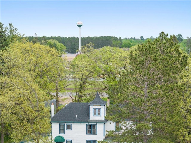 114 Washburn Ave W, Backus, MN 56435 - aerial view of property and surrounding area with a heavily wooded area