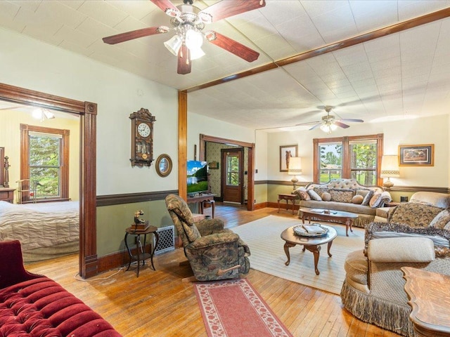 114 Washburn Ave W, Backus, MN 56435 - living area featuring ceiling fan and wood-type flooring
