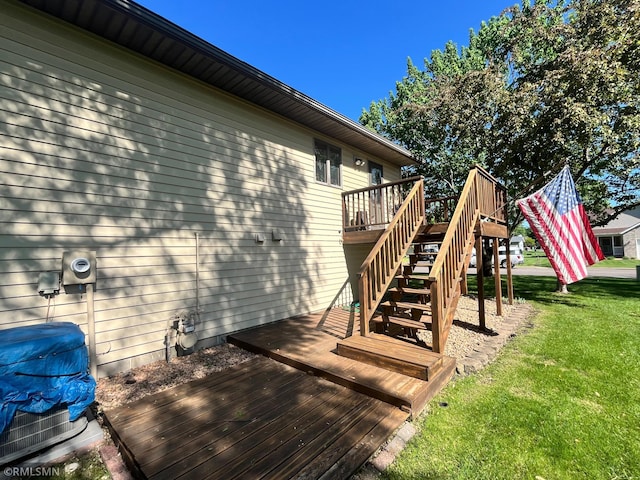 204 10th St N, Sartell, MN 56377 - deck featuring a lawn and stairs