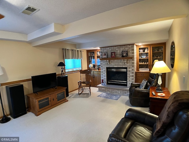 204 10th St N, Sartell, MN 56377 - living room featuring carpet floors, a fireplace, and a textured ceiling