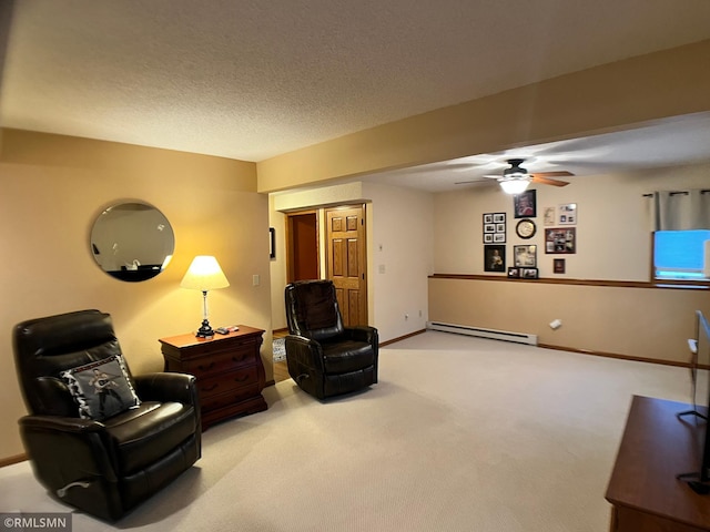 204 10th St N, Sartell, MN 56377 - living area with a baseboard radiator, carpet floors, a ceiling fan, baseboards, and a textured ceiling