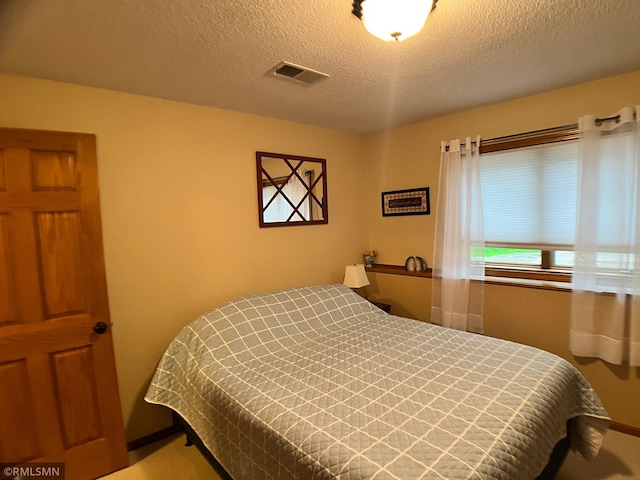 204 10th St N, Sartell, MN 56377 - bedroom with a textured ceiling