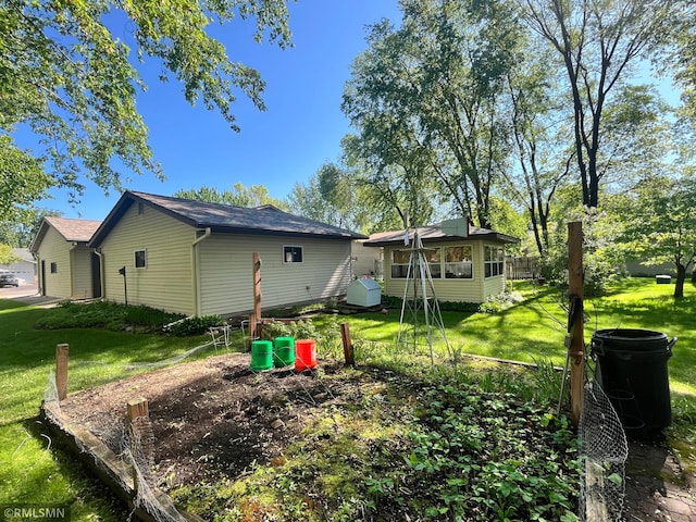 204 10th St N, Sartell, MN 56377 - rear view of house with a yard