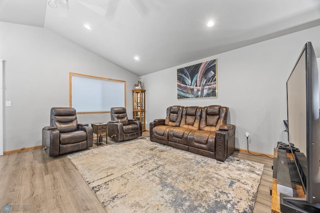 6738 Joseph St, Horace, ND 58047 - living room featuring light wood finished floors, vaulted ceiling, recessed lighting, and baseboards
