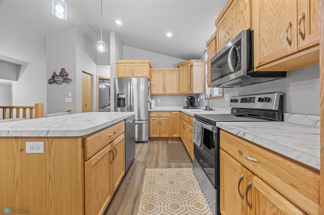 6738 Joseph St, Horace, ND 58047 - kitchen with stainless steel appliances, a sink, light countertops, a center island, and lofted ceiling