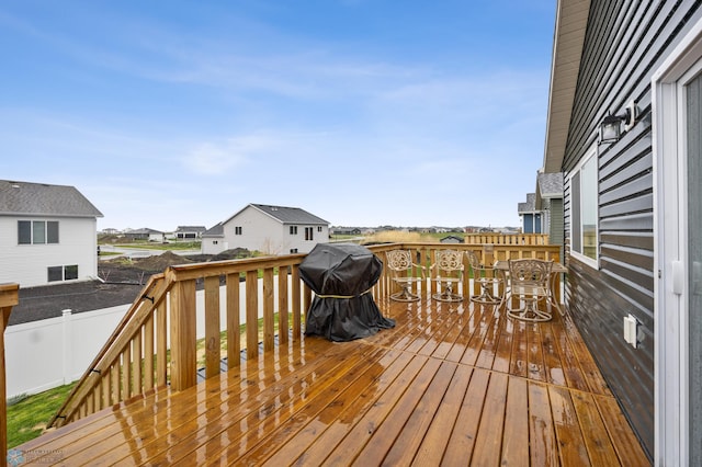 6738 Joseph St, Horace, ND 58047 - wooden deck featuring a residential view and a grill