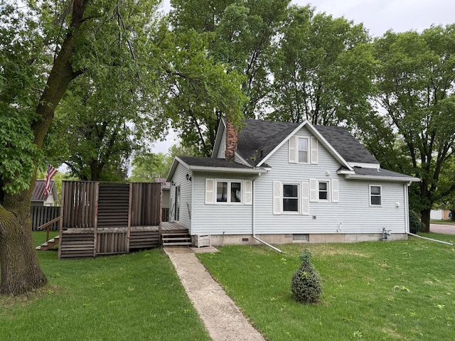 412 Vernon Ave, Morgan, MN 56266 - rear view of property with a wooden deck, a chimney, and roof with shingles