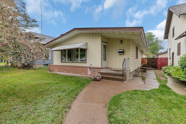 148 21st Ave N, Saint Cloud, MN 56303 - view of front of home with board and batten siding