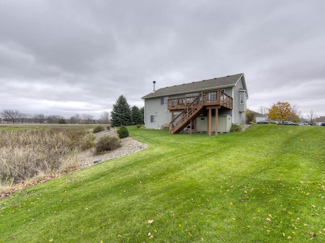 3335 Aaron Dr, Elko New Market, MN 55054 - rear view of property with a deck, stairs, and a yard