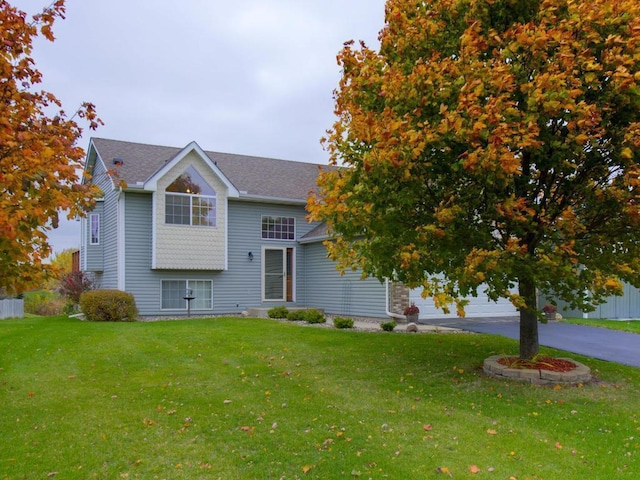 3335 Aaron Dr, Elko New Market, MN 55054 - view of front of home featuring a front lawn, asphalt driveway, and roof with shingles
