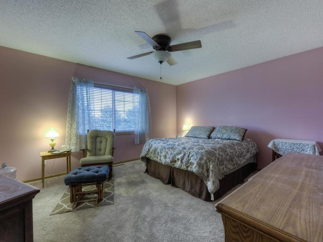 3335 Aaron Dr, Elko New Market, MN 55054 - carpeted bedroom with a textured ceiling, a ceiling fan, and baseboards