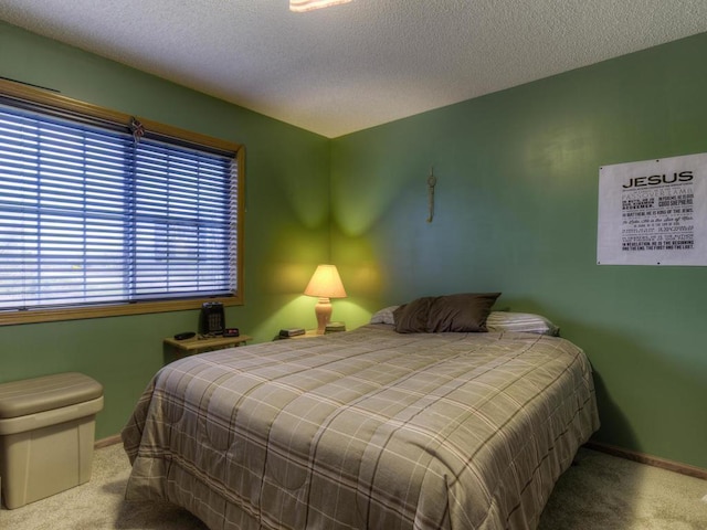 3335 Aaron Dr, Elko New Market, MN 55054 - carpeted bedroom featuring baseboards and a textured ceiling