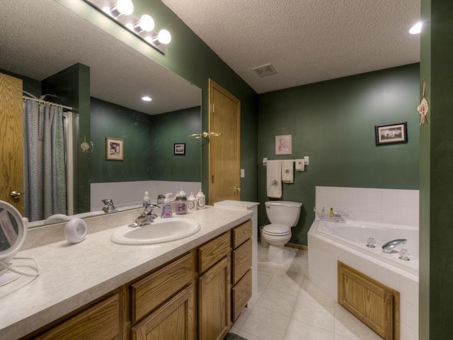 3335 Aaron Dr, Elko New Market, MN 55054 - full bathroom featuring a textured ceiling, toilet, tile patterned floors, vanity, and a bath