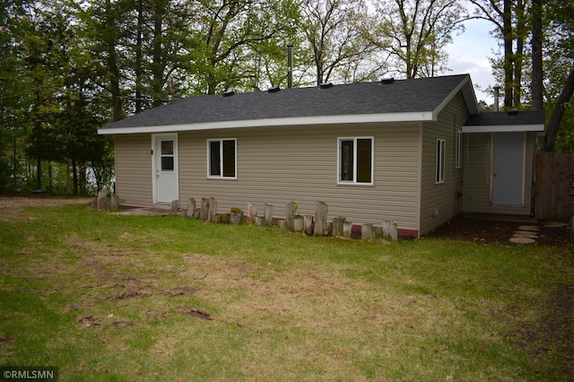48080 218th Pl, Mcgregor, MN 55760 - back of house with a yard and a shingled roof