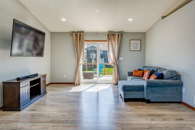 1004 7th Ave NW, Kasson, MN 55944 - living room with light wood-type flooring, baseboards, and recessed lighting