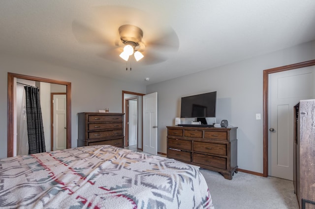 1004 7th Ave NW, Kasson, MN 55944 - bedroom with light colored carpet, baseboards, and a ceiling fan
