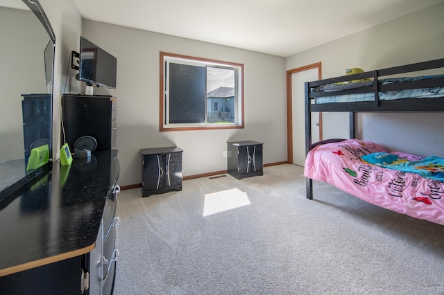 1004 7th Ave NW, Kasson, MN 55944 - bedroom with light colored carpet and baseboards
