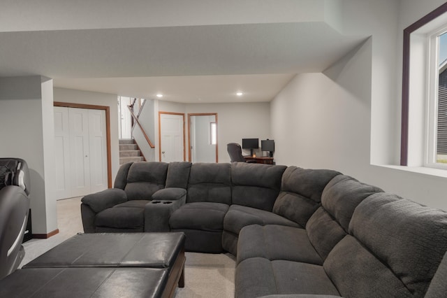 1004 7th Ave NW, Kasson, MN 55944 - living room with plenty of natural light, stairway, light colored carpet, and recessed lighting