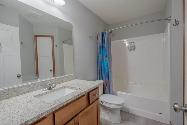 1004 7th Ave NW, Kasson, MN 55944 - bathroom with vanity, shower / tub combo with curtain, toilet, and tile patterned flooring