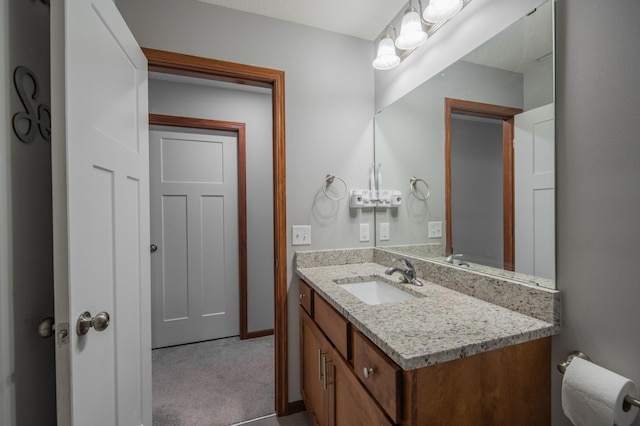 1004 7th Ave NW, Kasson, MN 55944 - half bathroom featuring vanity and baseboards