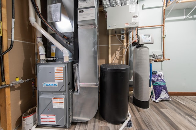 1004 7th Ave NW, Kasson, MN 55944 - utility room featuring water heater and heating unit