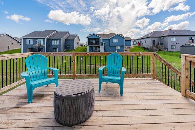 1004 7th Ave NW, Kasson, MN 55944 - wooden deck with a residential view and a lawn