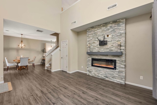 20338 Kensfield Trl Unit 1606, Lakeville, MN 55044 - living area with stairs, wood finished floors, a stone fireplace, and baseboards