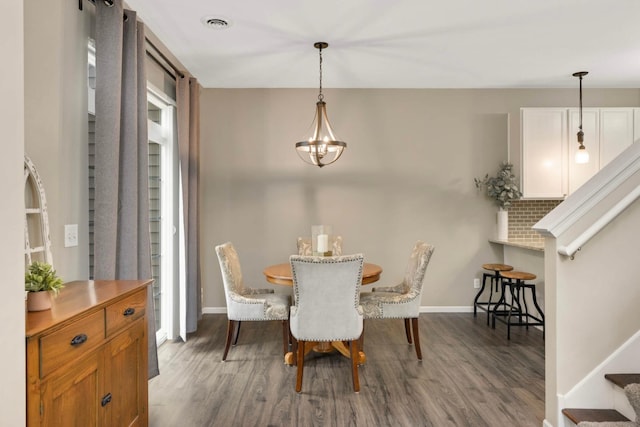 20338 Kensfield Trl Unit 1606, Lakeville, MN 55044 - dining space with dark wood-type flooring, a chandelier, baseboards, and stairs