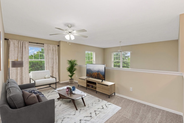 20338 Kensfield Trl Unit 1606, Lakeville, MN 55044 - carpeted living room featuring a ceiling fan, baseboards, and plenty of natural light