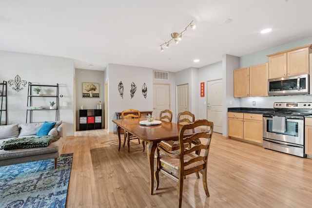 4132 Vernon Ave S Unit A103, Saint Louis Park, MN 55416 - dining room with light wood-style flooring
