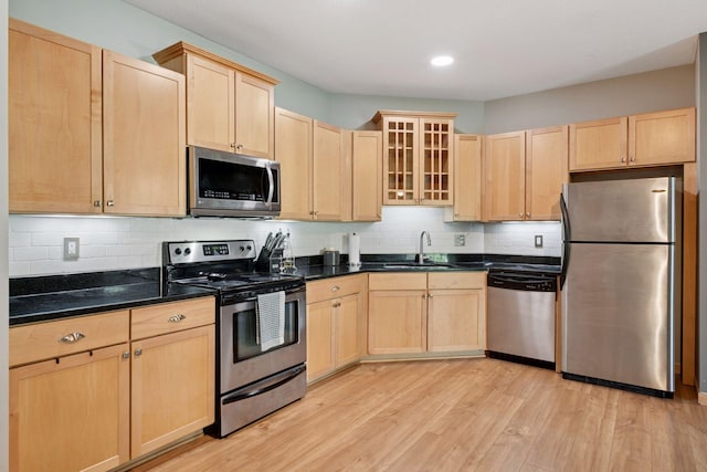4132 Vernon Ave S Unit A103, Saint Louis Park, MN 55416 - kitchen featuring appliances with stainless steel finishes, light brown cabinets, and recessed lighting