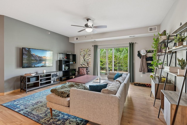 4132 Vernon Ave S Unit A103, Saint Louis Park, MN 55416 - living room featuring ceiling fan, wood finished floors, and baseboards