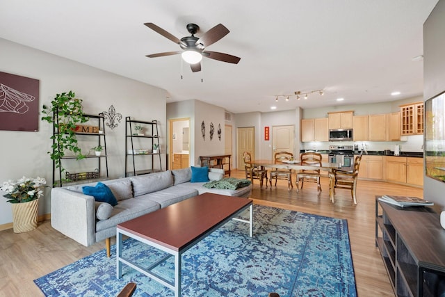 4132 Vernon Ave S Unit A103, Saint Louis Park, MN 55416 - living room featuring a ceiling fan, light wood-style flooring, and recessed lighting