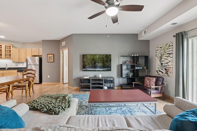 4132 Vernon Ave S Unit A103, Saint Louis Park, MN 55416 - living area with ceiling fan, light wood-type flooring, and baseboards