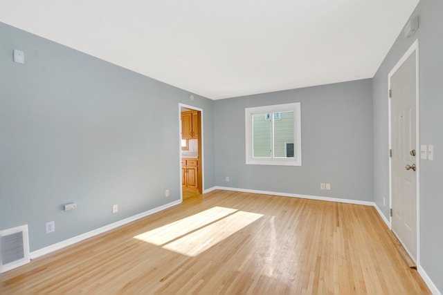 3311 Yukon Ave S, Saint Louis Park, MN 55426 - spare room with light wood-style flooring and baseboards