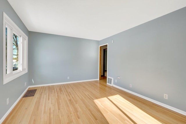 3311 Yukon Ave S, Saint Louis Park, MN 55426 - unfurnished room featuring wood finished floors and baseboards