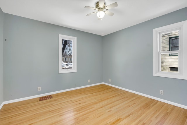 3311 Yukon Ave S, Saint Louis Park, MN 55426 - empty room with baseboards, a ceiling fan, and wood finished floors