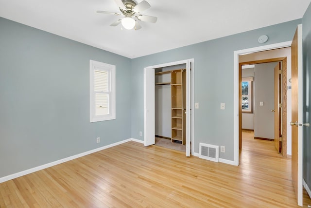 3311 Yukon Ave S, Saint Louis Park, MN 55426 - unfurnished bedroom with light wood-style flooring, baseboards, a closet, and ceiling fan