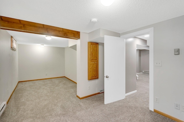 3311 Yukon Ave S, Saint Louis Park, MN 55426 - finished basement with light carpet, baseboard heating, a textured ceiling, and baseboards