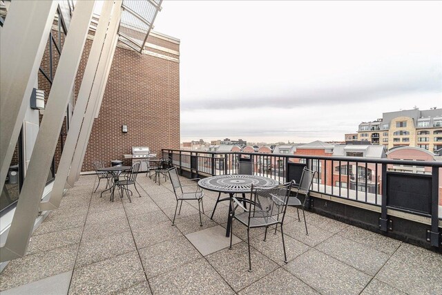 401 2nd St N Unit 220, Minneapolis, MN 55401 - view of patio with a balcony and outdoor dining space