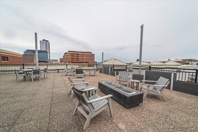 401 2nd St N Unit 220, Minneapolis, MN 55401 - view of patio featuring a fire pit