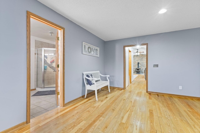 1680 Bluebird Ln, Mound, MN 55364 - hallway with wood finished floors, baseboards, and recessed lighting
