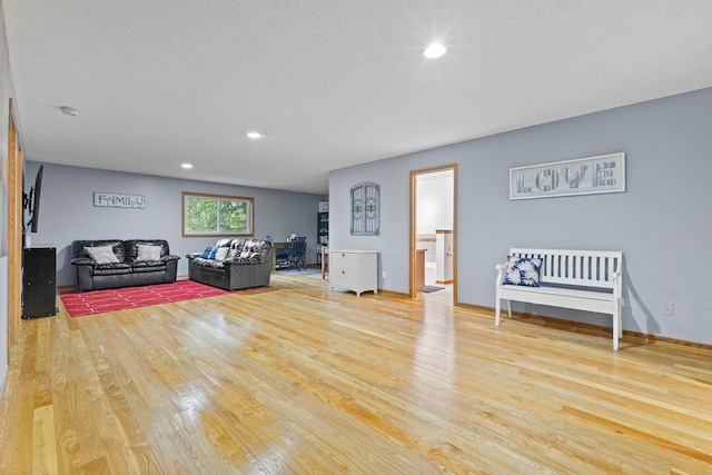 1680 Bluebird Ln, Mound, MN 55364 - living room featuring wood finished floors, recessed lighting, and a textured ceiling