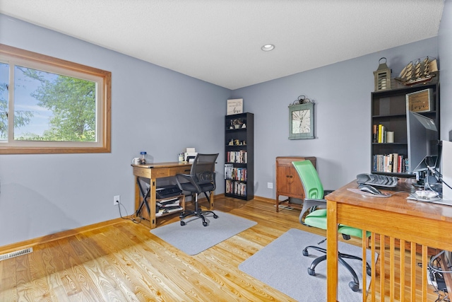 1680 Bluebird Ln, Mound, MN 55364 - office space featuring wood finished floors, baseboards, and recessed lighting