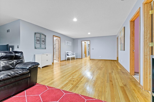 1680 Bluebird Ln, Mound, MN 55364 - living area featuring light wood-style floors, recessed lighting, and baseboards