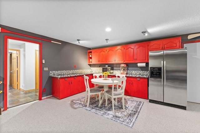 1680 Bluebird Ln, Mound, MN 55364 - kitchen featuring appliances with stainless steel finishes, baseboards, light colored carpet, and open shelves